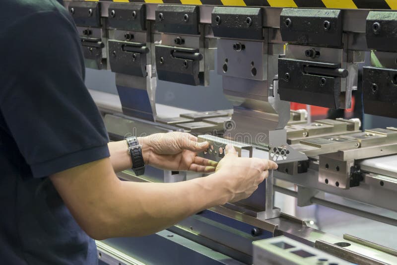 The Operator Working with Hydraulic Press Brake Bending Machine Stock