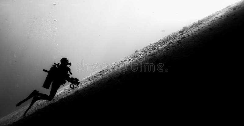 Operatore subacqueo Ascending fotografia stock Operatore subacqueo Ascending fotografia stock