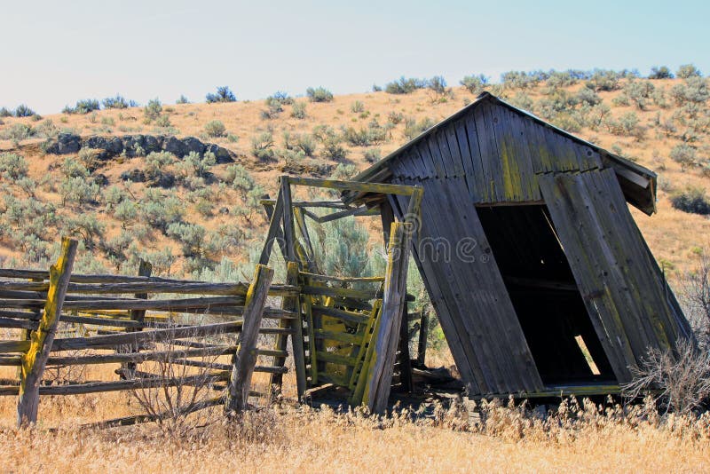 Weathered Outbuilding Leaning Precariously in the Wild West. Weathered Outbuilding Leaning Precariously in the Wild West