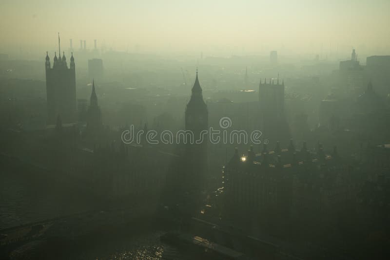 A foggy day in London as seen from a birds eye perspective. Big Ben and Westminster palace are in view. A foggy day in London as seen from a birds eye perspective. Big Ben and Westminster palace are in view