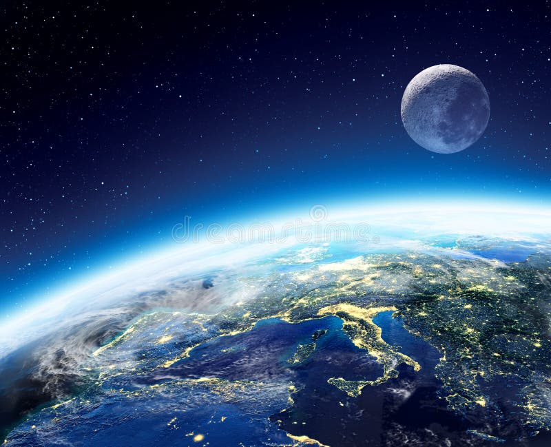 Opinión de la tierra y de la luna del espacio en la noche