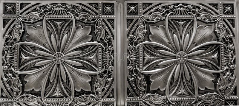 Fabulous amazing, detailed closeup view of dark silver, metallic, interior ceiling decoration tiles. Fabulous amazing, detailed closeup view of dark silver, metallic, interior ceiling decoration tiles