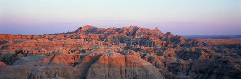 Sunset panoramic view of mountains in Badlands National Park in South Dakota. Sunset panoramic view of mountains in Badlands National Park in South Dakota