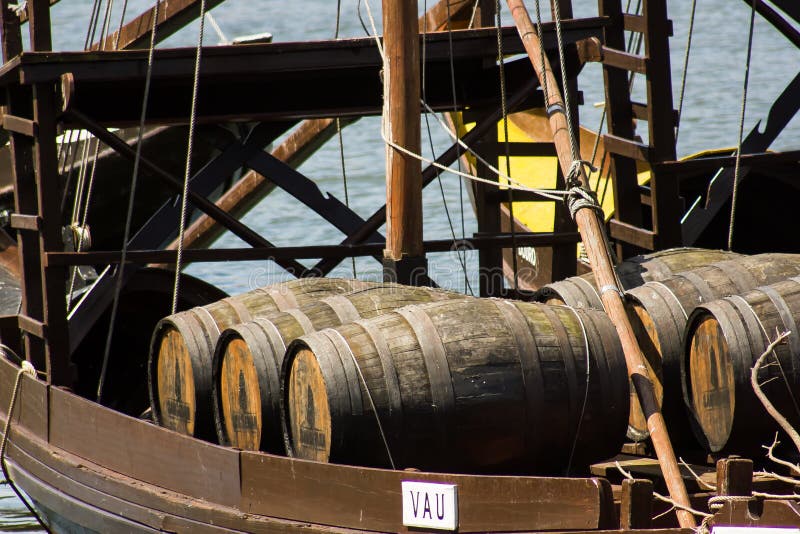 Oporto, Portugal: detail of rabelo boat with barrels of Port wine