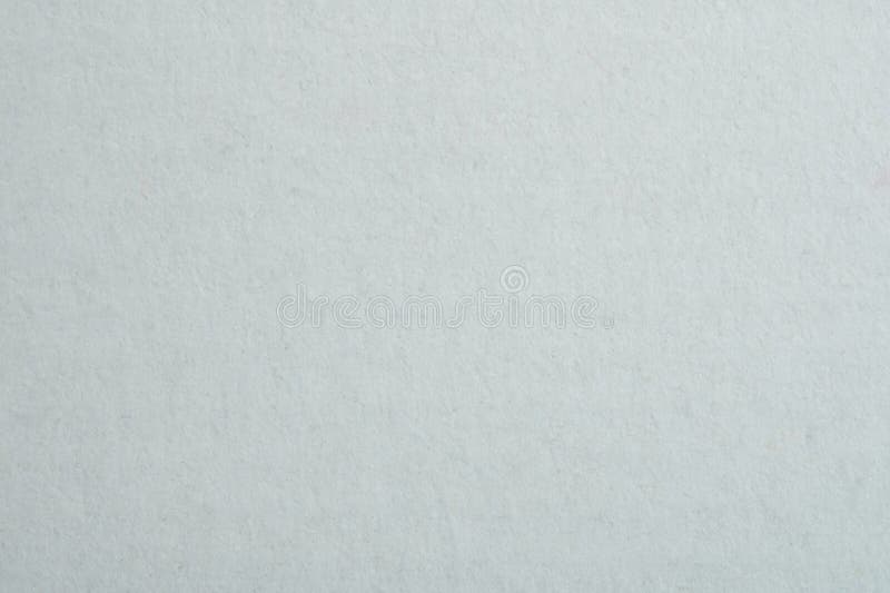 Oppervlak van grijs ruw papier stock afbeeldingen