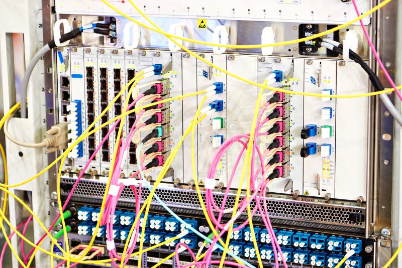 Optical Transport Systems. Fiber Optic Cables on Switch Stock Photo