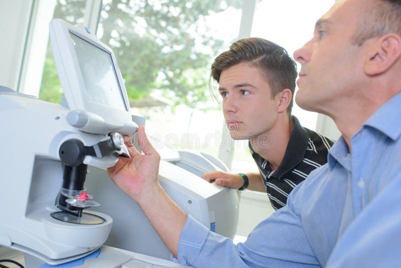 Optometrist Using Mydriatics Eye Drops To Numb Eyes Stock Image Image