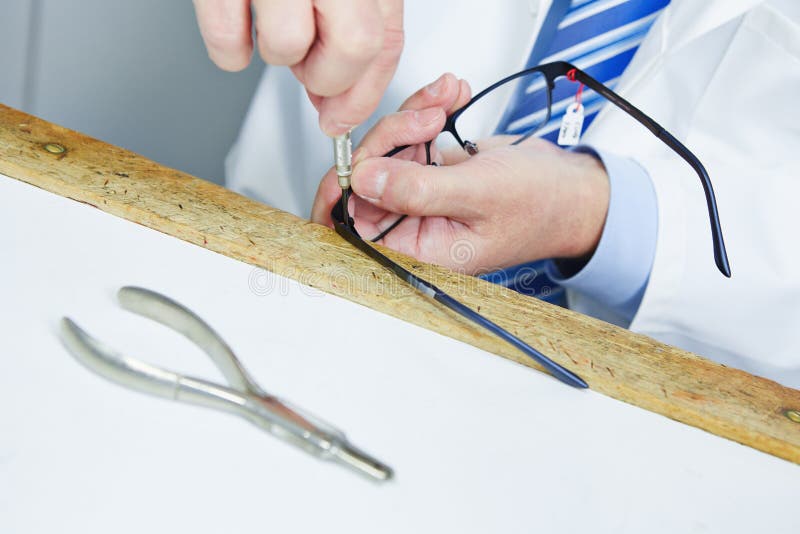 Optician with glasses stock image. Image of repairing 30798957