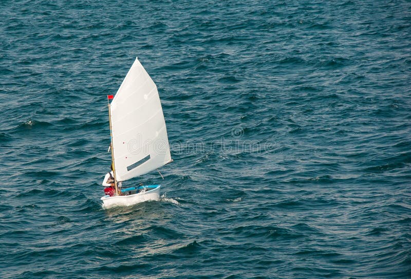 Optimist sailboat stock image. Image of championship ...