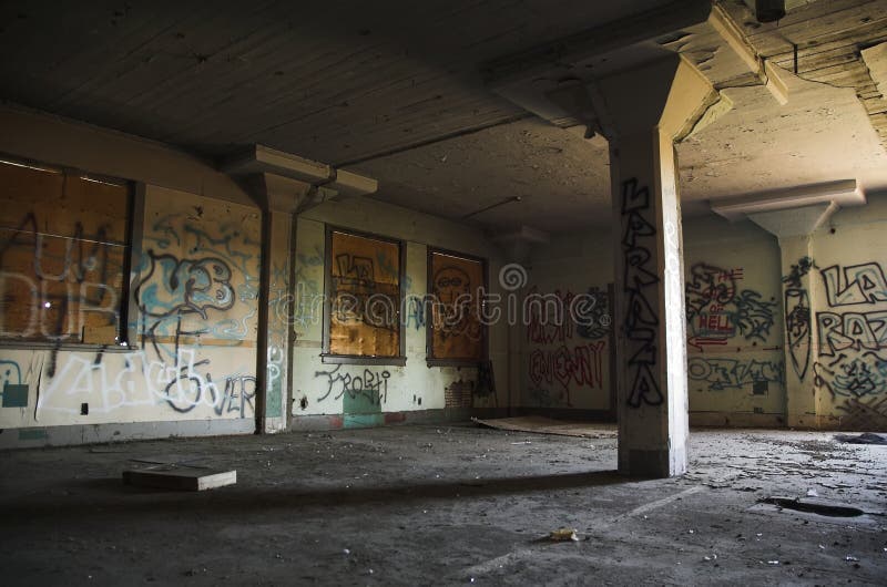 Abandoned, graffiti filled warehouse in a dangerous part of the city. Abandoned, graffiti filled warehouse in a dangerous part of the city.