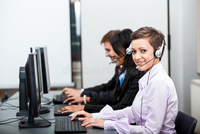 Friendly callcenter agent operator with headset telephone support service. Friendly callcenter agent operator with headset telephone support service