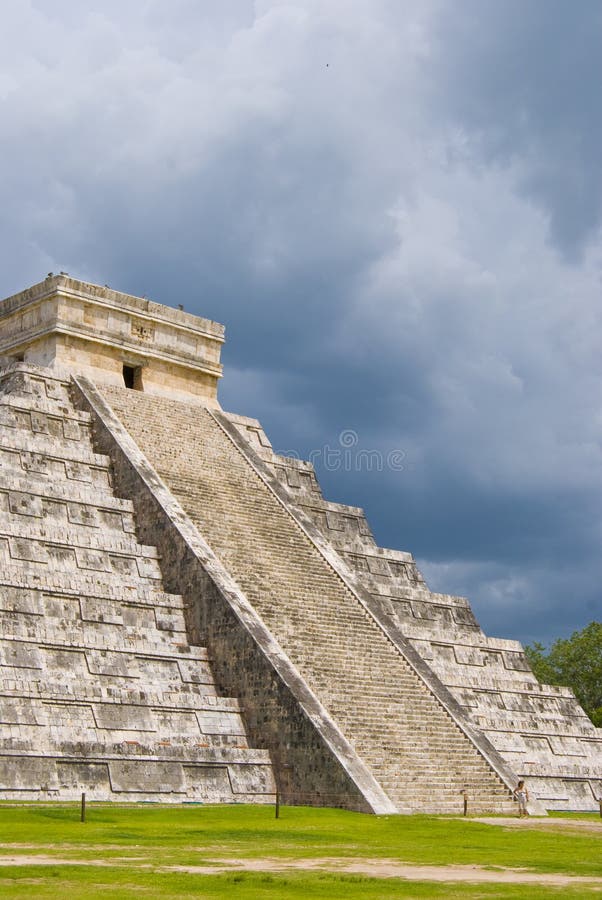 Main Mayan temple. Chichen Itza temple in Cancun, Yucatan area of Mexico. A view of the mayan steps leading up to the temple. Main Mayan temple. Chichen Itza temple in Cancun, Yucatan area of Mexico. A view of the mayan steps leading up to the temple.