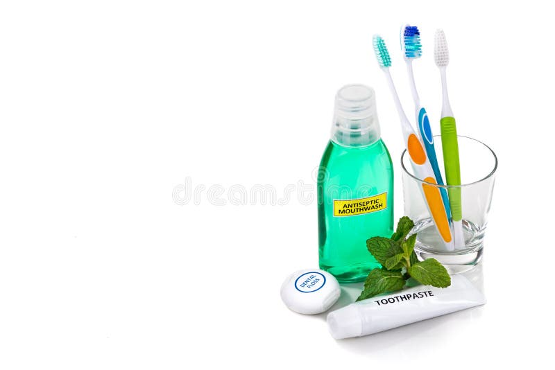 Oral care essential products tapered toothbrush, toothpaste, mouthwash, dental floss