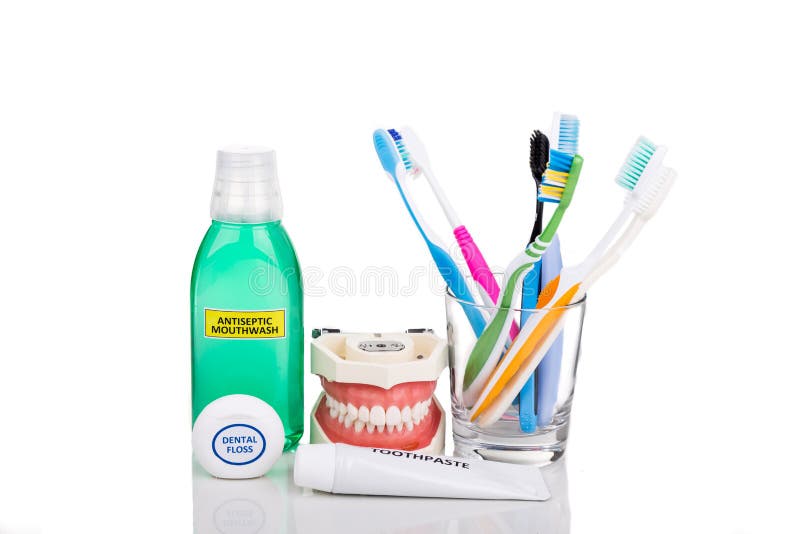 Oral care essential products tapered toothbrush, toothpaste, mouthwash, dental floss