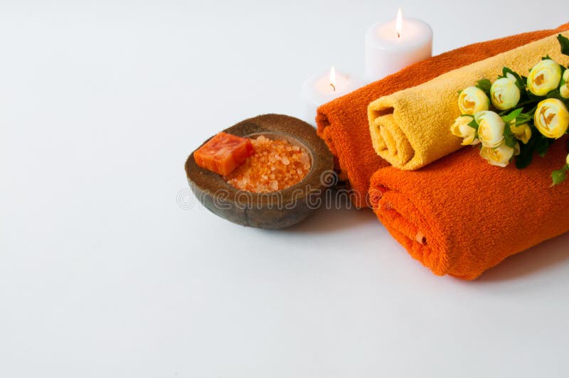 Orange Aromatherapy Bath Salt, Soap, Towels and Candles Stock Image