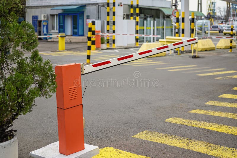 Vehicle approaching an access control gate with card reader