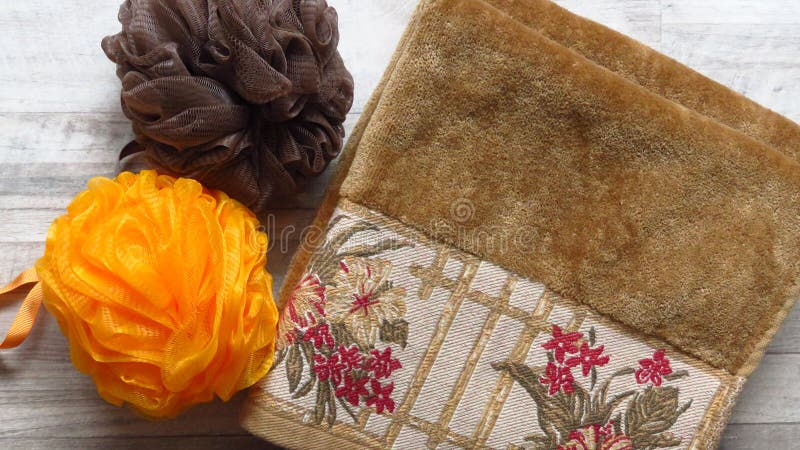 Orange Bath Sponge, Brown Bath Sponge, Ochre Colour Towel. stock images Orange Bath Sponge, Brown Bath Sponge, Ochre Colour Towel. stock images
