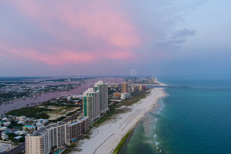 Orange Beach at sunset stock image. Image of vacation 254384103
