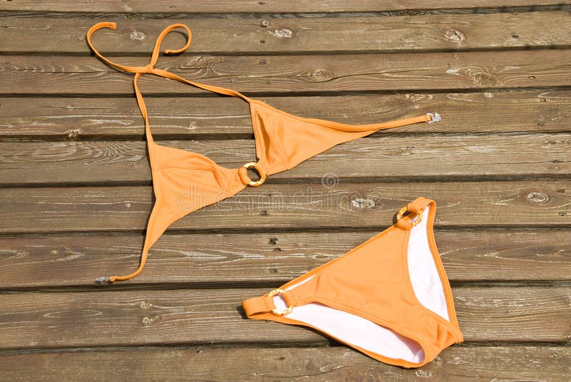 Orange bikini stock image. Image of shiny, beauty, nudity 42237215