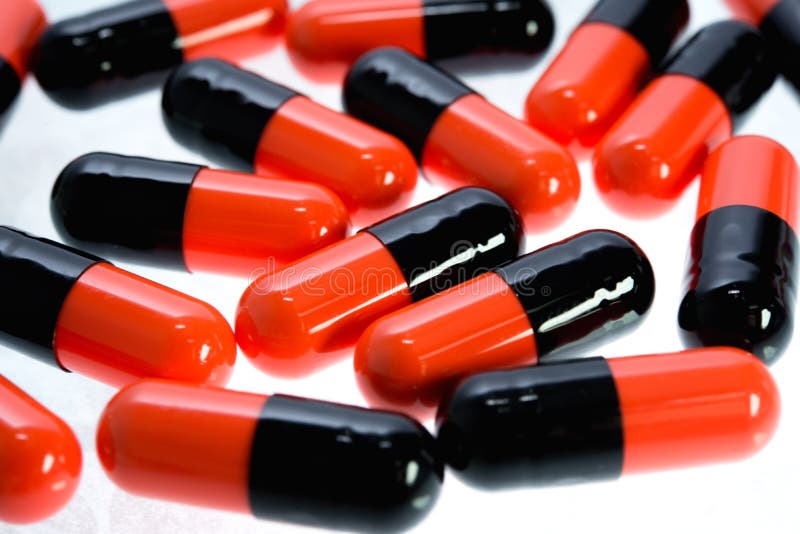 Orange And Black Pills Stock Photo Image 42324461