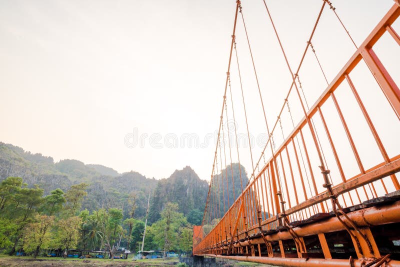 Orange bridge over song river in Vang Vieng,Laos stock photo Orange bridge over song river in Vang Vieng,Laos stock photo