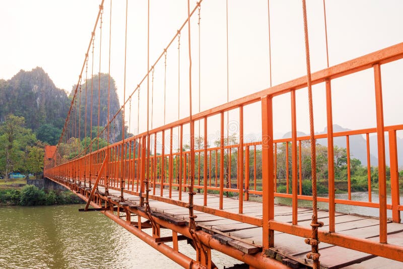 Orange bridge over song river in Vang Vieng,Laos stock photos Orange bridge over song river in Vang Vieng,Laos stock photos