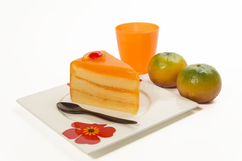 Orange cake with fresh orange and juice isolated on white background