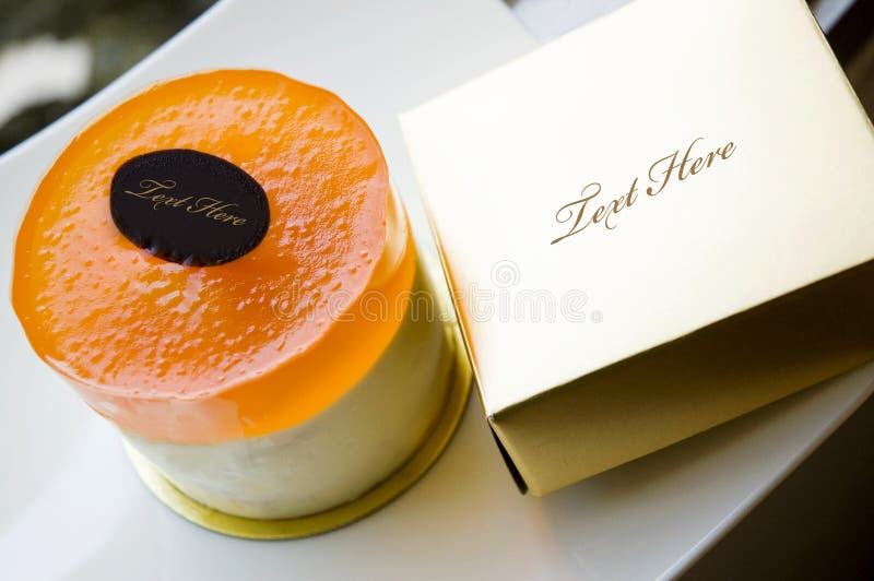 Orange cake with golden box