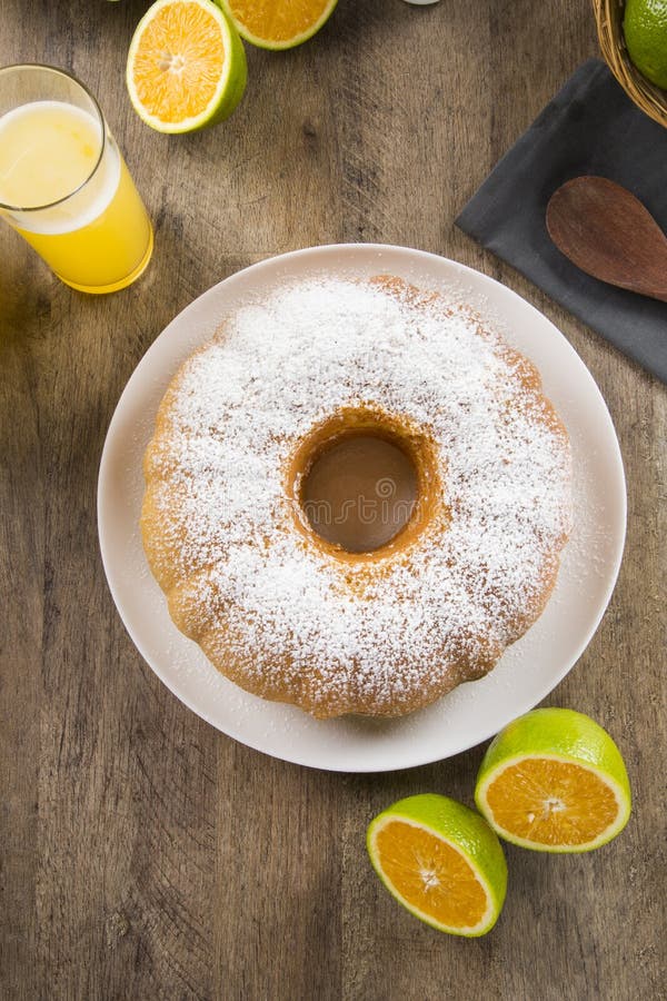 Orange Cake on the Table with Fruits and Juice. Stock Photo Image of