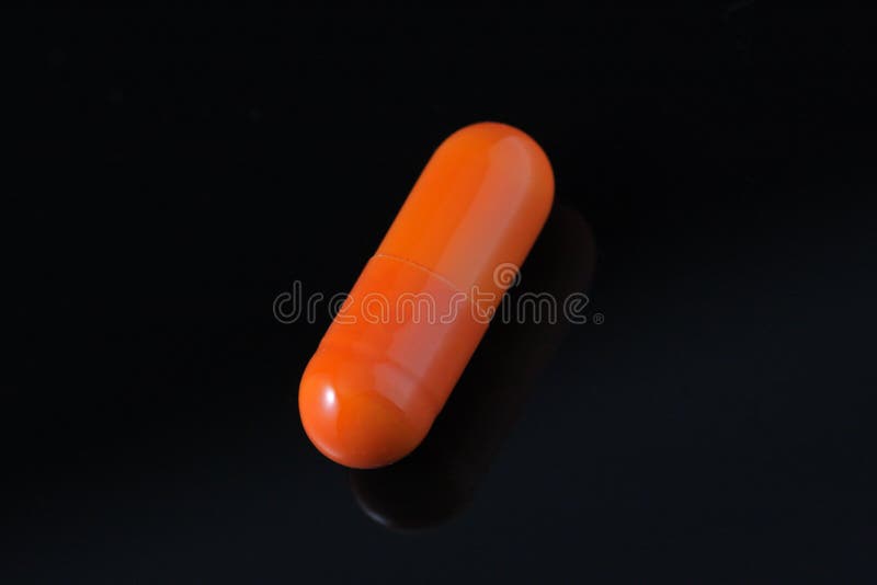 Orange capsule stock photo. Image of cure, pharmacy, drug 15220806
