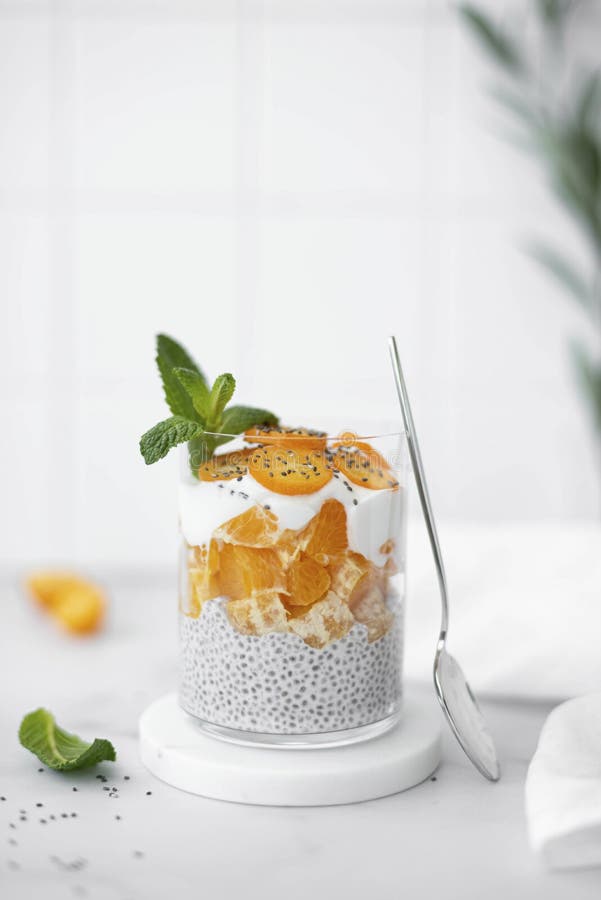Orange Chia Pudding with Greek Yogurt in a Glass, Closeup Stock Image