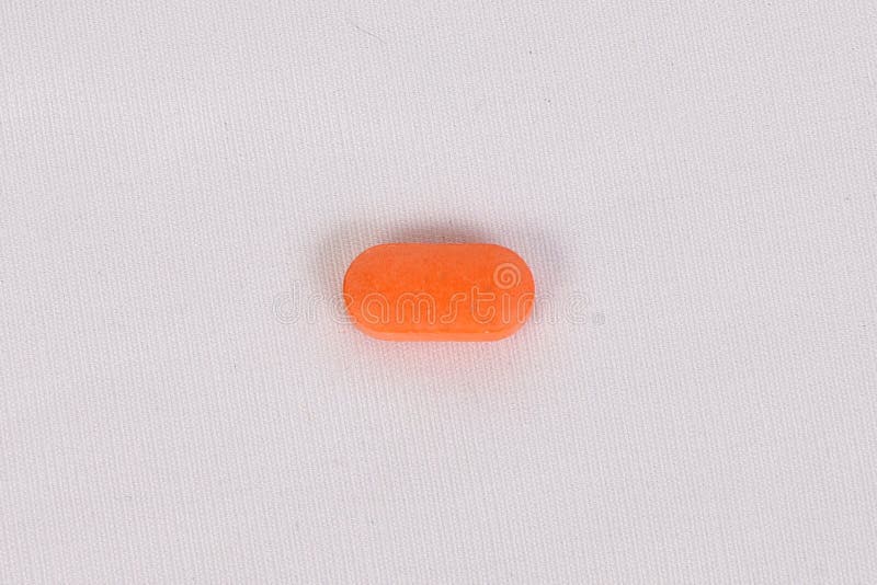 An orange color tablet stock image. Image of color, colour 216847865