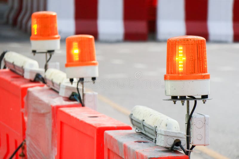 Orange exponera och kretsa ljus överst av staketet, siren med arkivfoto Orange exponera och kretsa ljus överst av staketet, siren med arkivfoto