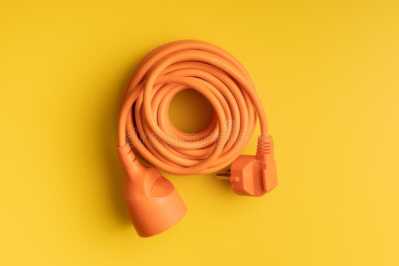 Orange Extension Power Cord on Yellow Background Stock Image Image of electric, electrician