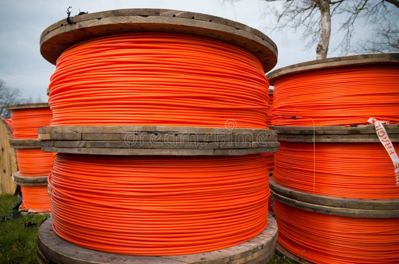 Orange fiber cables stock image. Image of distribution 64486615