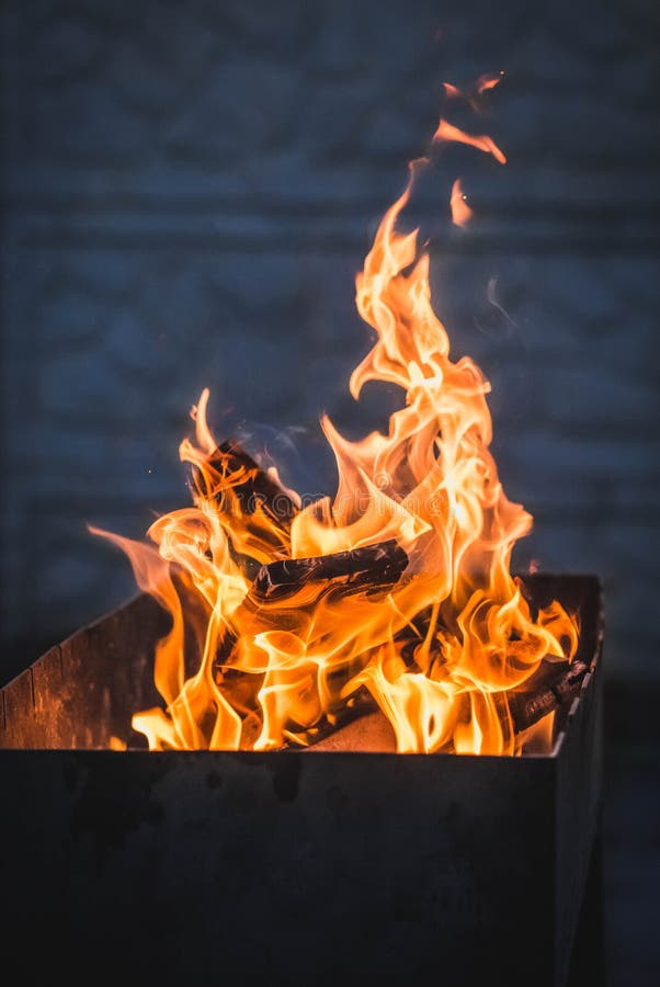 Orange Fire Burns at Night in Grill Stock Photo Image of flame, grill 183628776