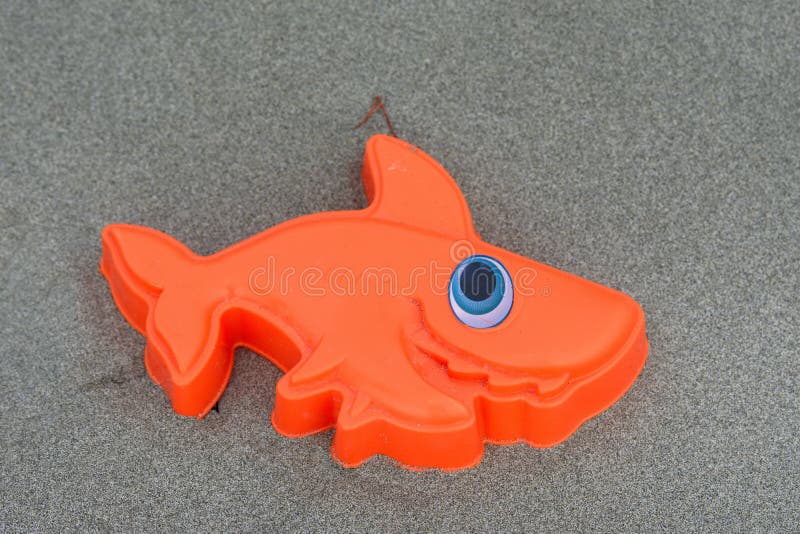 An Orange Fish Sand Toy at the Beach Stock Photo Image of animal
