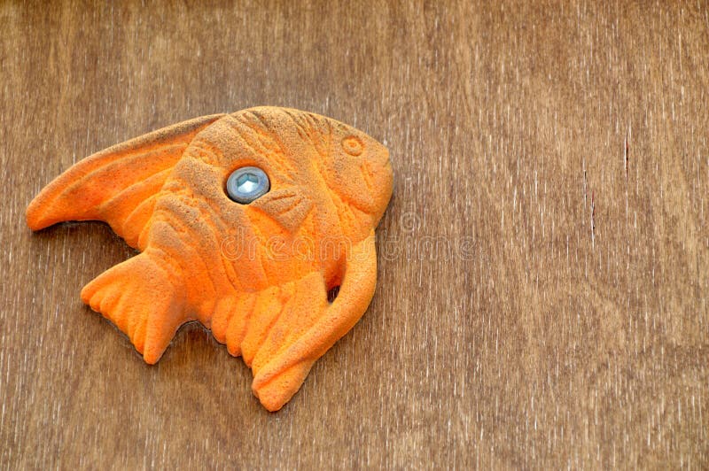 Orange Fish Toy On Wooden Background With Copy Space Stock Image