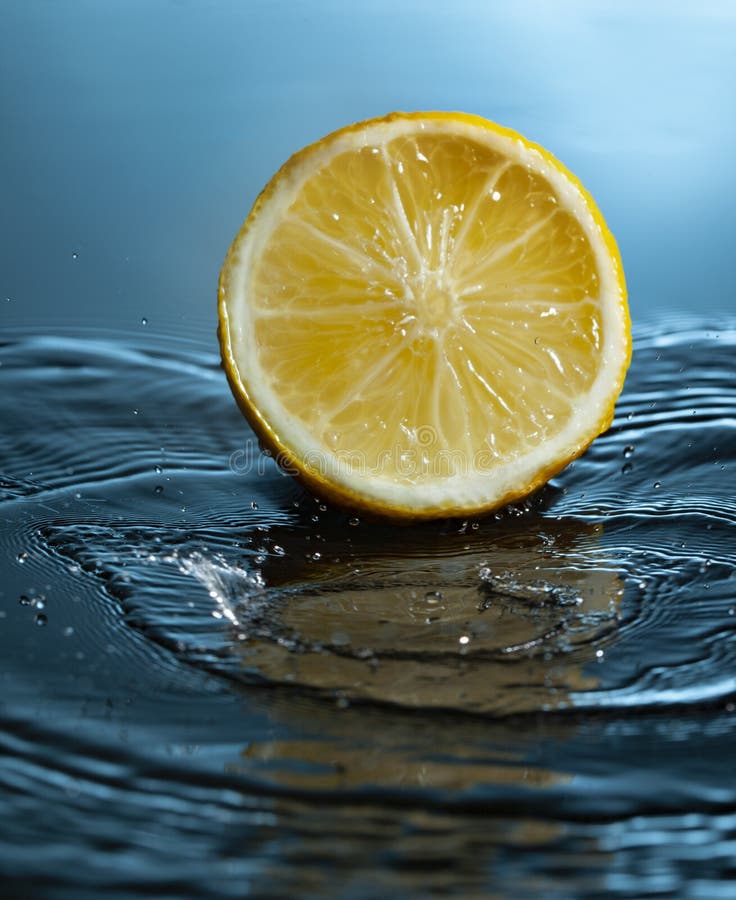 Orange Fruit Slice in Water Splash, Healthy Food Concept Stock Photo