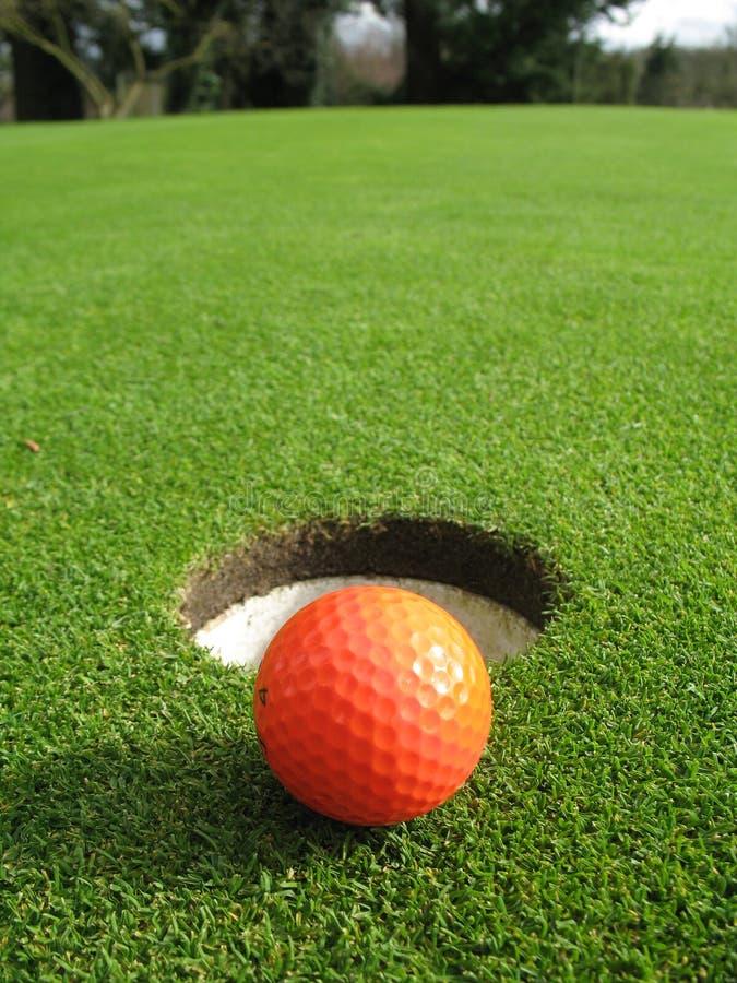 Orange golf ball stock image. Image of putt, retirement 4565681