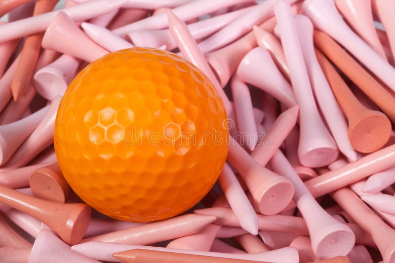 Orange Golf Ball Lying between Wooden Tees Stock Image Image of hobby