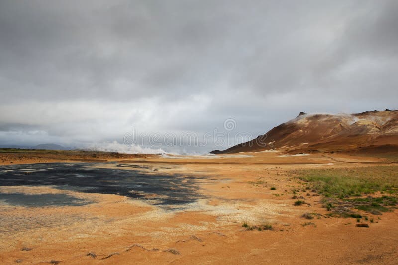 Orange ground and hot steam at Hverarond area, Iceland