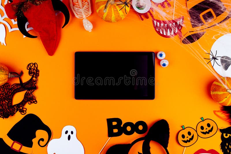 Orange holiday Halloween background with Halloween props stock image Orange holiday Halloween background with Halloween props stock image