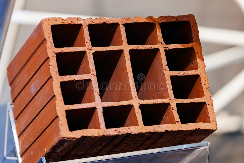 Orange hollow clay block stock photo