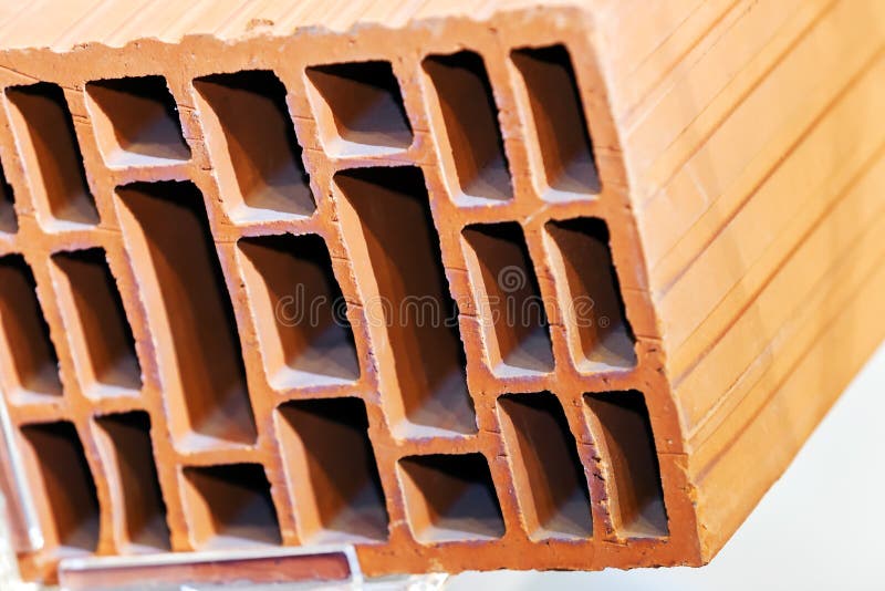 Orange hollow clay block stock image