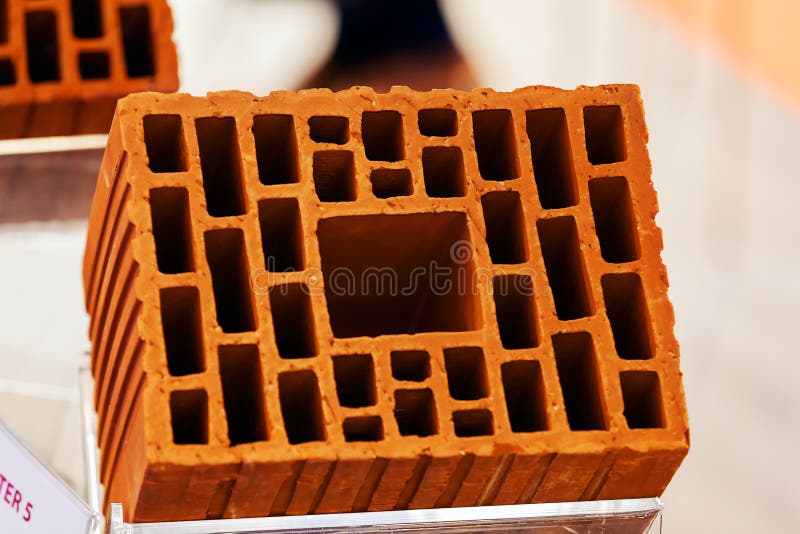 Orange hollow clay block stock photo
