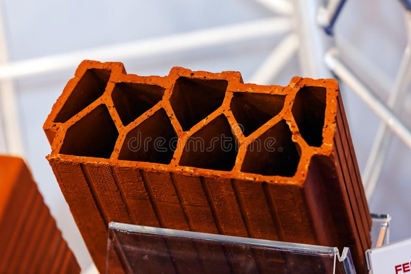 Orange hollow clay block stock images