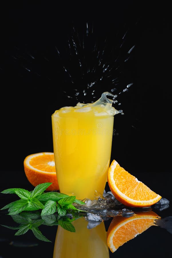 Orange Ice Drink with Splash Stock Photo Image of motion, party