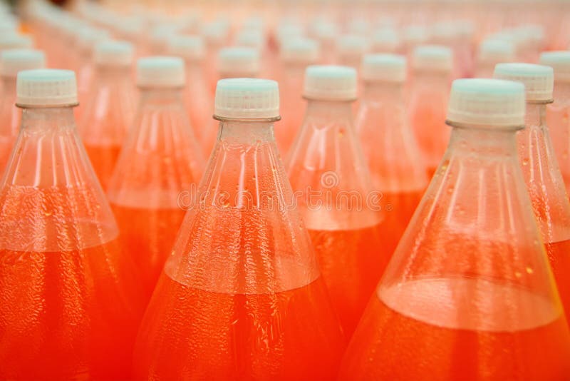 Orange juice beverage plastic bottle in factory