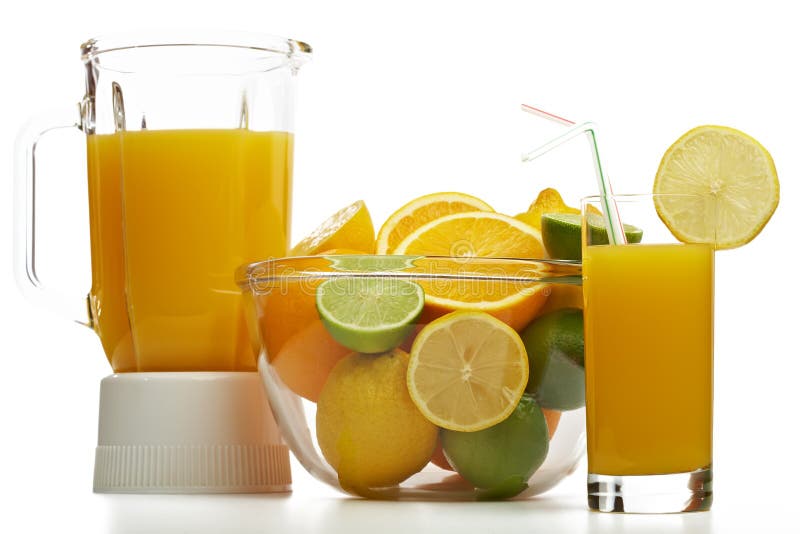 Orange juice and blender with fruit stock photography